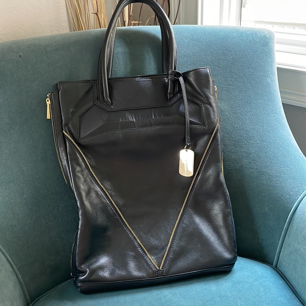 Vince Camuto gold zipper embellished leather